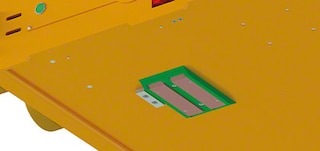 De borstels worden gebruikt om de shuttle automatisch op te laden