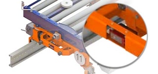 Fotocellen maken het systeem veiliger door de juiste afstand tussen de karretjes te bewaren