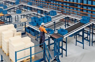 Kistentransportbanen leveren ook zijmappen in automatische magazijnen